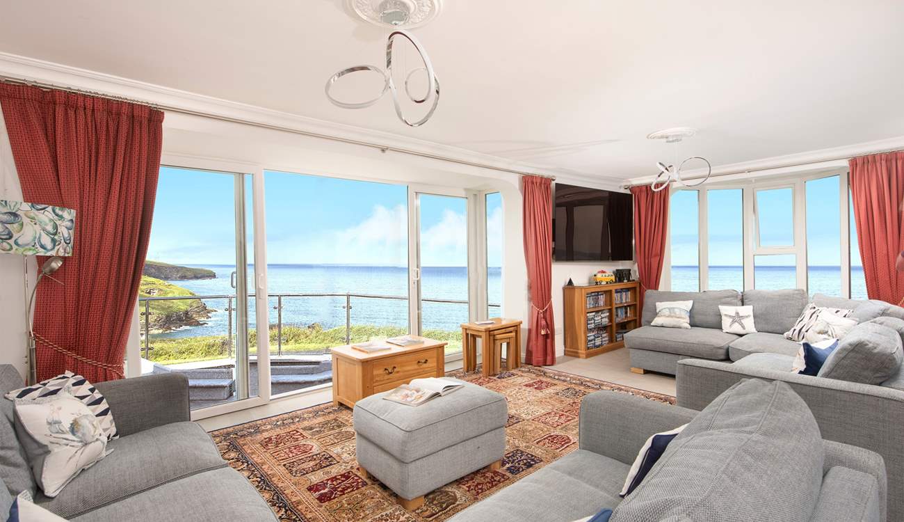 The large spacious sitting-room takes full advantage of the view.