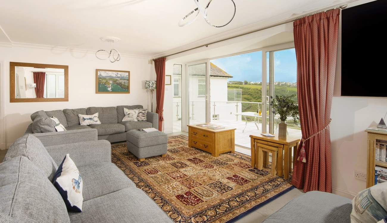 Patio doors lead out from the sitting-area to the large terrace.