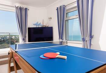 Or maybe Table Tennis is your game. Either way once you have finished playing, the games table can be stored upright so that you can enjoy the room as a Sung again. 