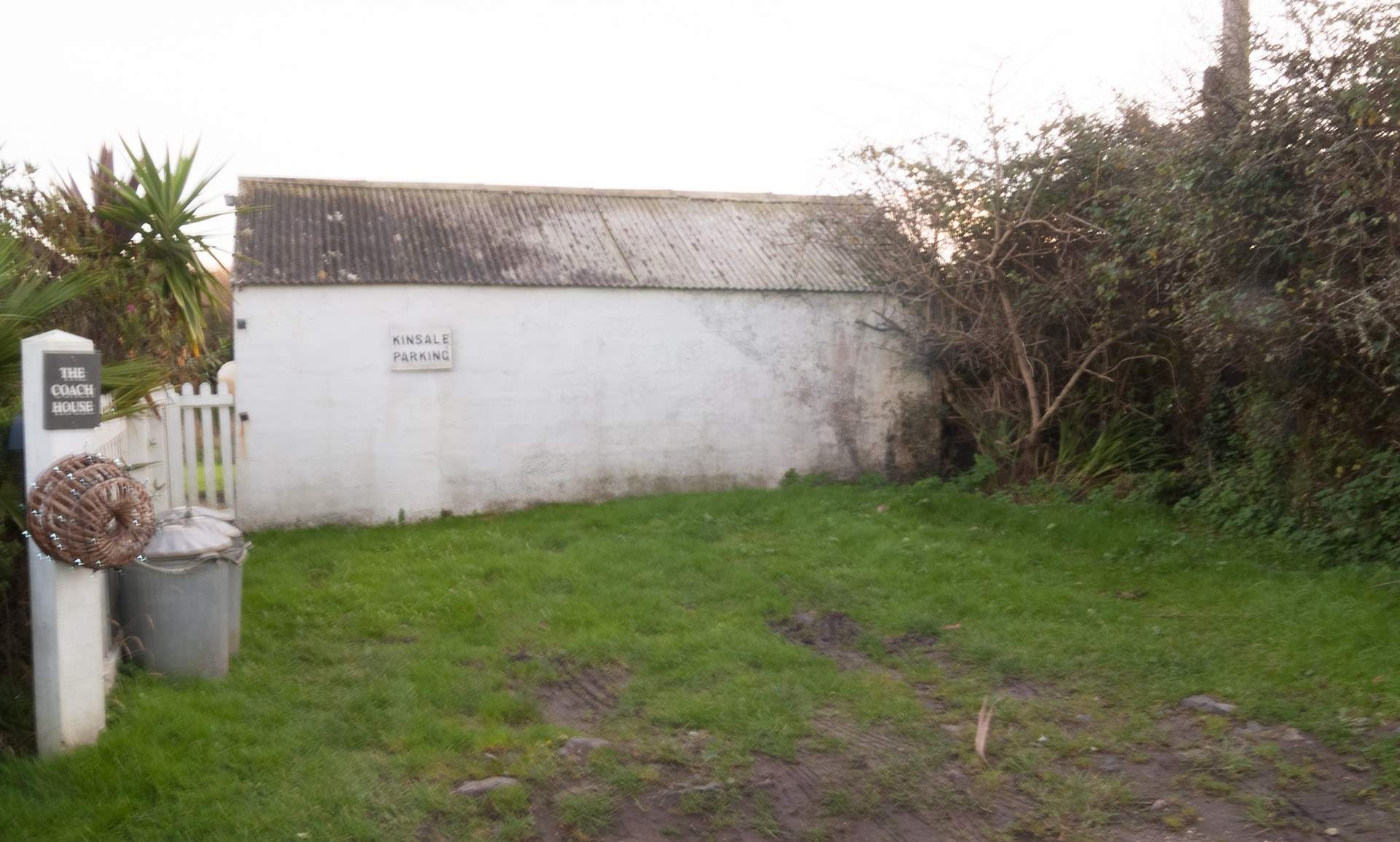 The parking area is located 450 yards up the steep winding hill beside the cottage on the left side of the lane as it starts to level, and has room for two cars.