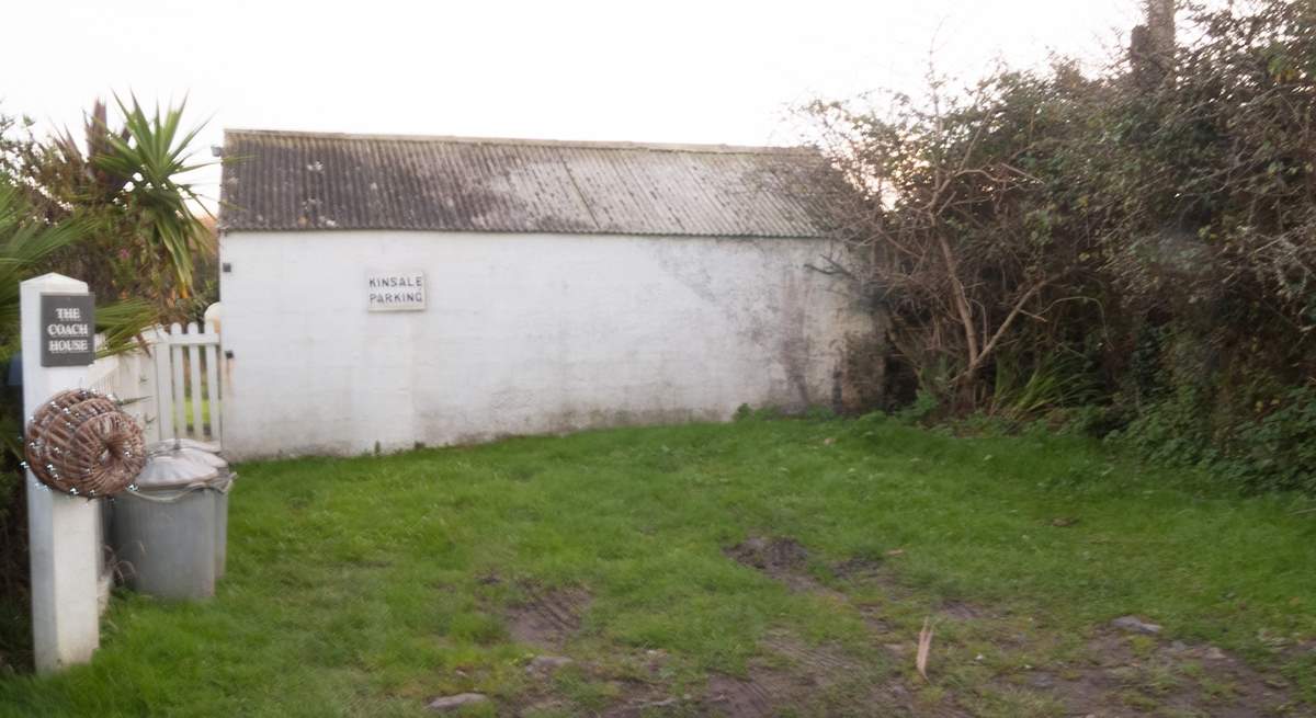 The parking area is located 450 yards up the steep winding hill beside the cottage on the left side of the lane as it starts to level, and has room for two cars.