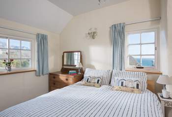 This bedroom has sea views, lie in bed and listen to the crashing waves.