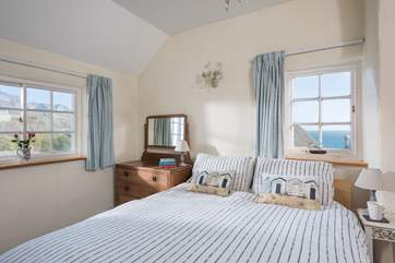 This bedroom has sea views, lie in bed and listen to the crashing waves.
