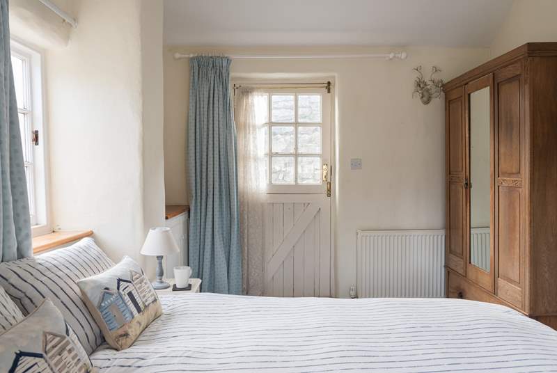 This bedroom (Bedroom 3) also has direct access out to the terraced garden, perfect for sneaking out to watch the sunrise.