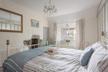 The master bedroom (Bedroom 1) is very calming and has a small en suite shower-room.