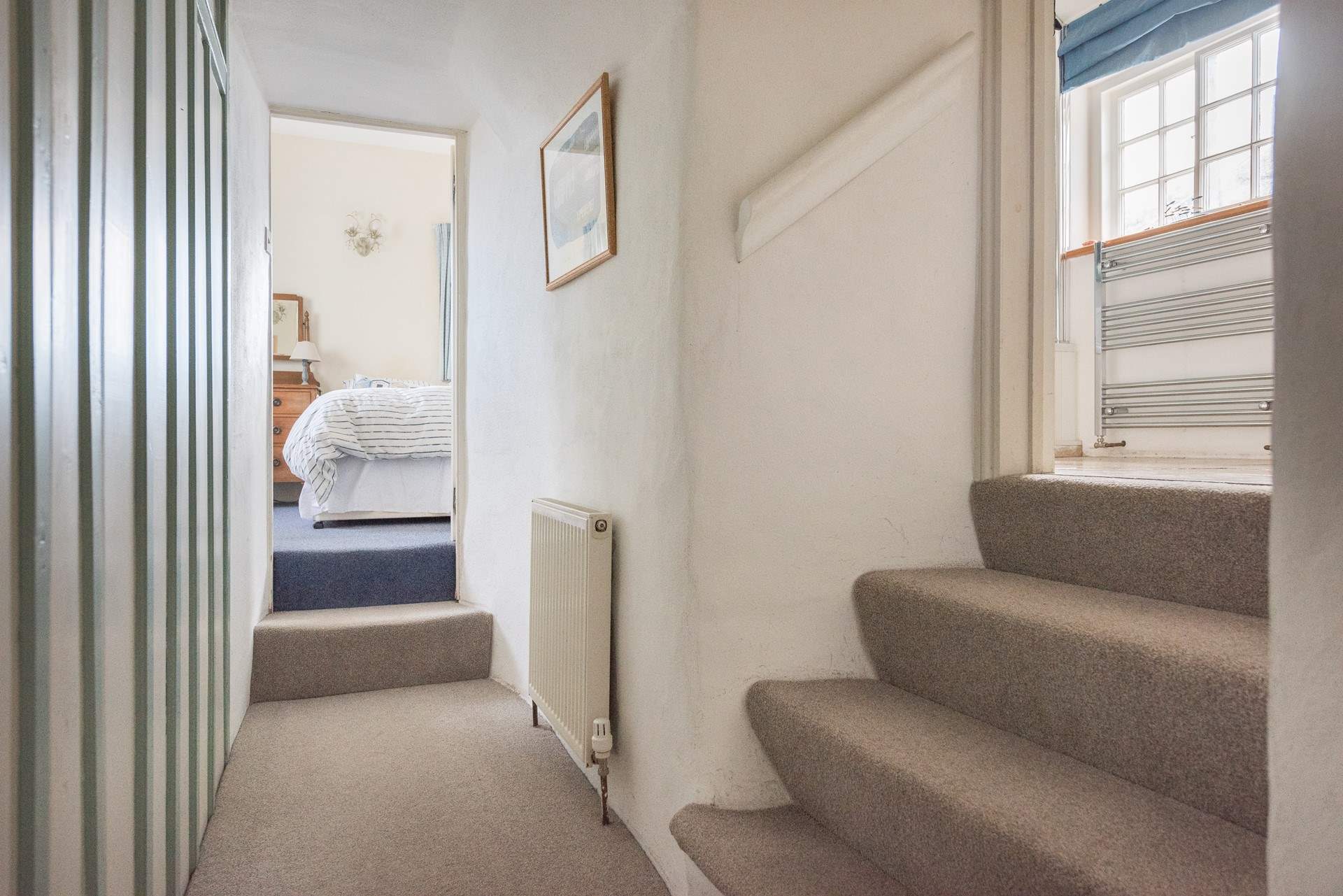 This charming old cottage has lots of little steps up into the bathroom and bedrooms.