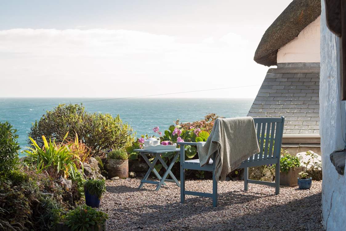 Soak up the morning rays at the front of the cottage whilst the world passes you by.
