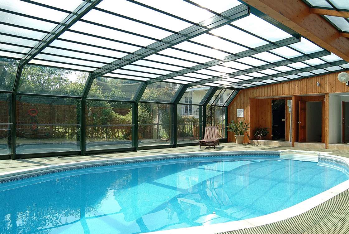 The pool house roof is sometimes opened when the weather is fine.