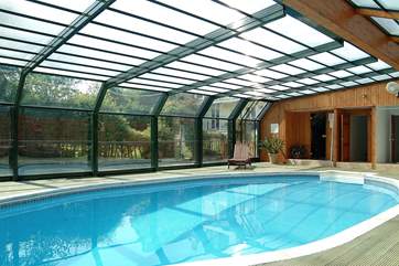 The pool house roof is sometimes opened when the weather is fine.