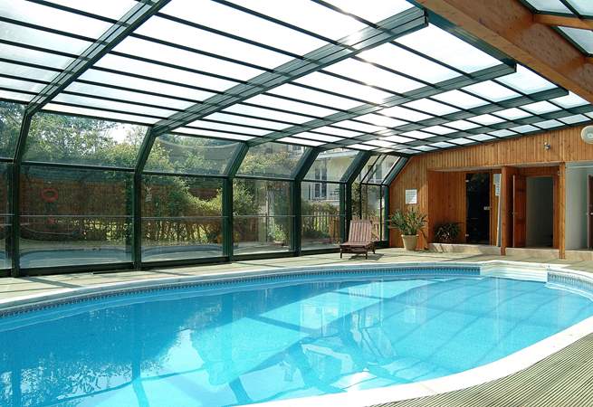 The pool house roof is sometimes opened when the weather is fine.