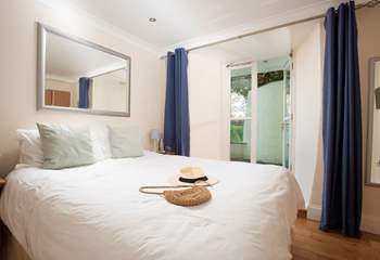 Bedroom 2 with a 5' king-size bed.