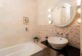 The bathroom en suite to Bedroom 1.