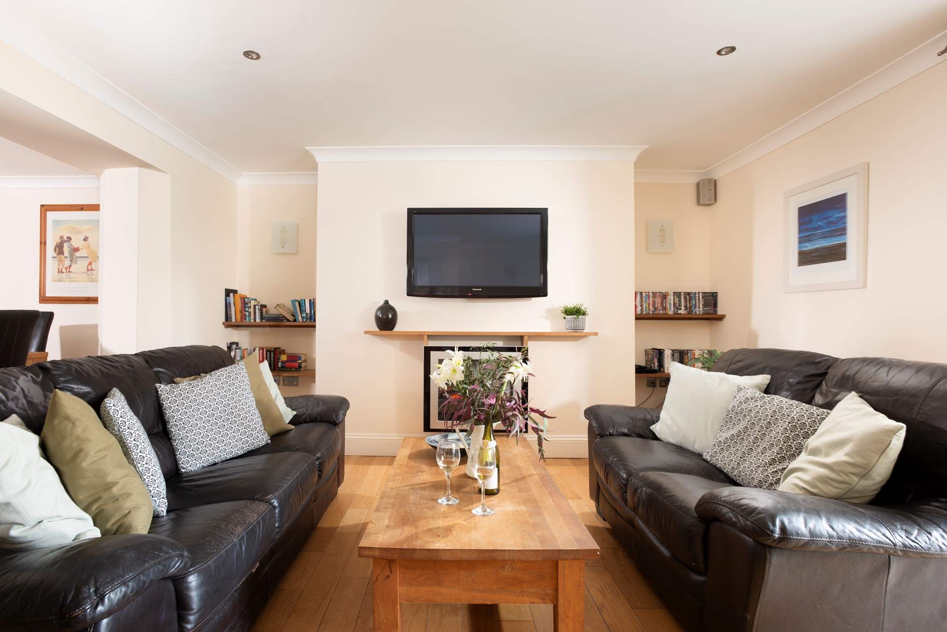 Comfortable sofas, a warming fire and a large TV to relax in front of with a good film.