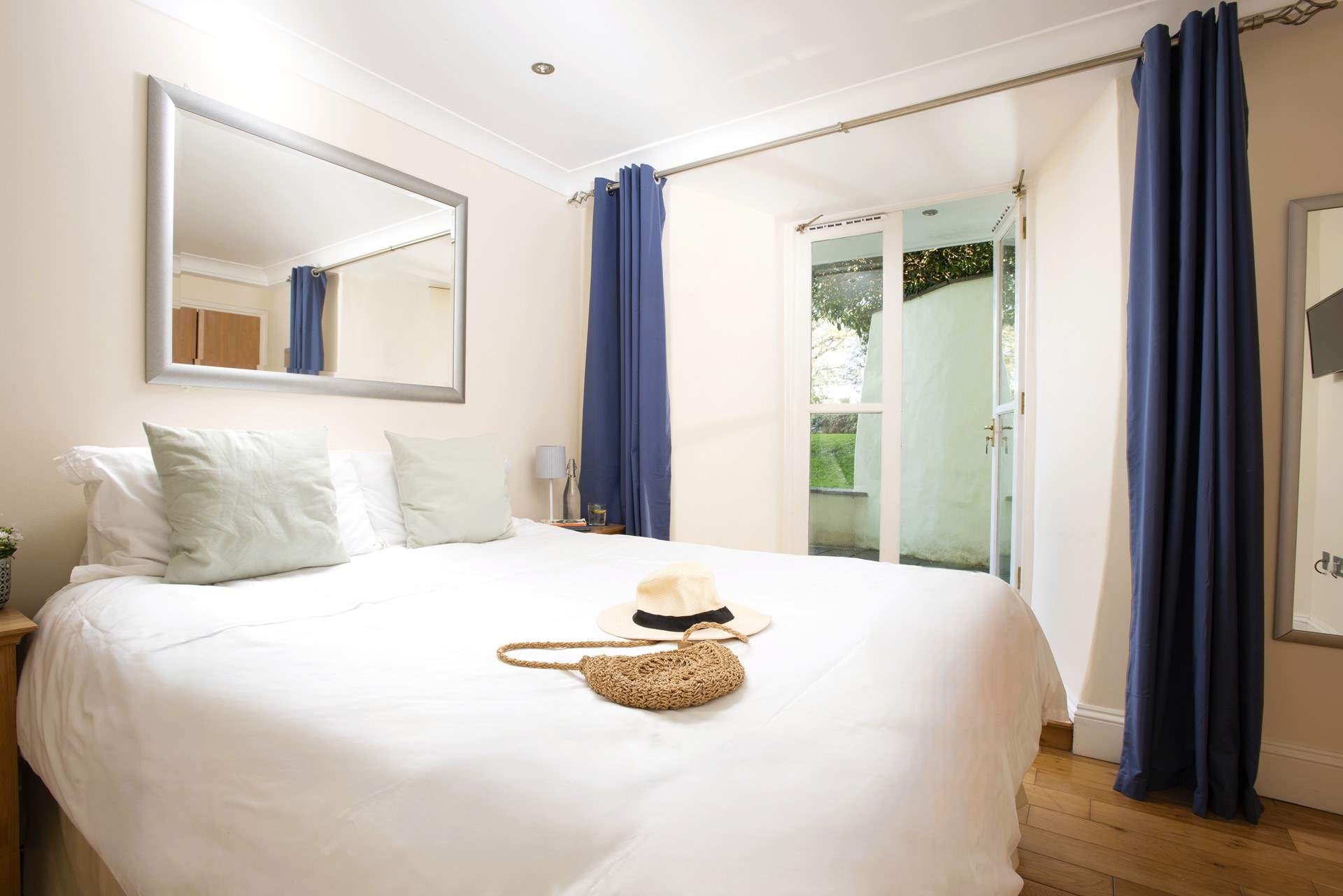 A king-size bed awaits in Bedroom 2.