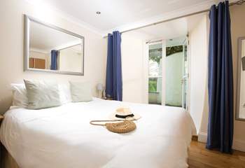 A king-size bed awaits in Bedroom 2.