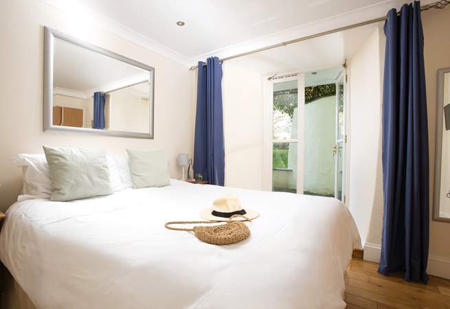 A king-size bed awaits in Bedroom 2.