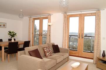 The open plan living-room is light and airy and has great views.