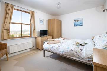 The master bedroom also boasts far reaching views.