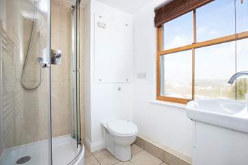 The master ensuite shower room - even the shower has the view!