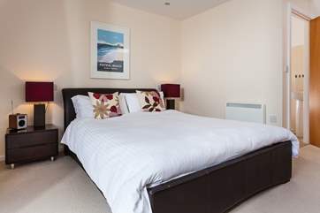 The master bedroom, located on the second floor, also has an en suite shower room.