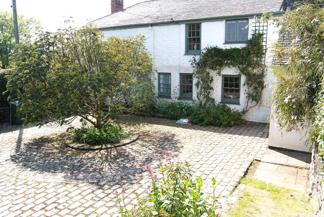 The rear enclosed parking-area.