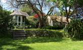 Steps lead up from the house to the lawn and summer-house. - Thumbnail Image