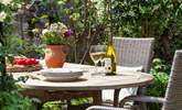 The sunny rear garden has many hidden little spots, which are perfect for a glass of wine. - Thumbnail Image