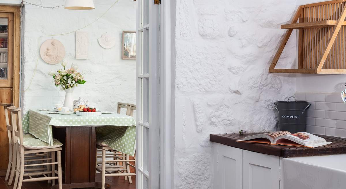 The utility-room leads into the kitchen/diner.