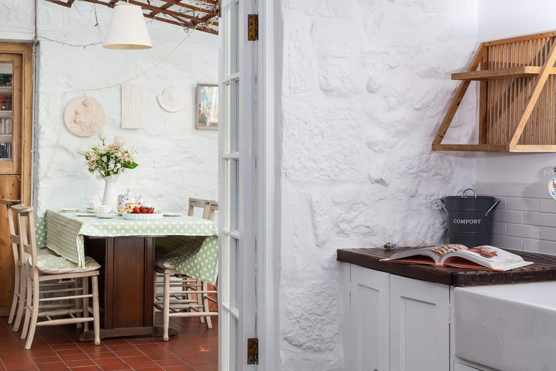 The utility-room leads into the kitchen/diner.