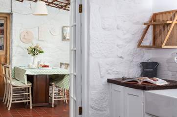 The utility room leads into the kitchen/diner.