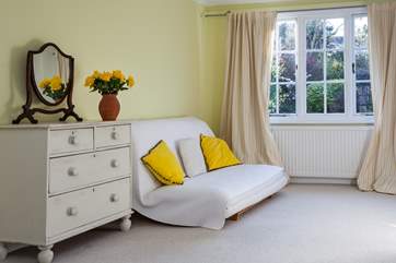 Bedroom 3 has a lovely sofa to snuggle up on with a good book.