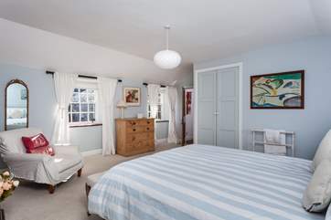 Bedroom 4 is spacious and bright and full of lovely soft furnishings.