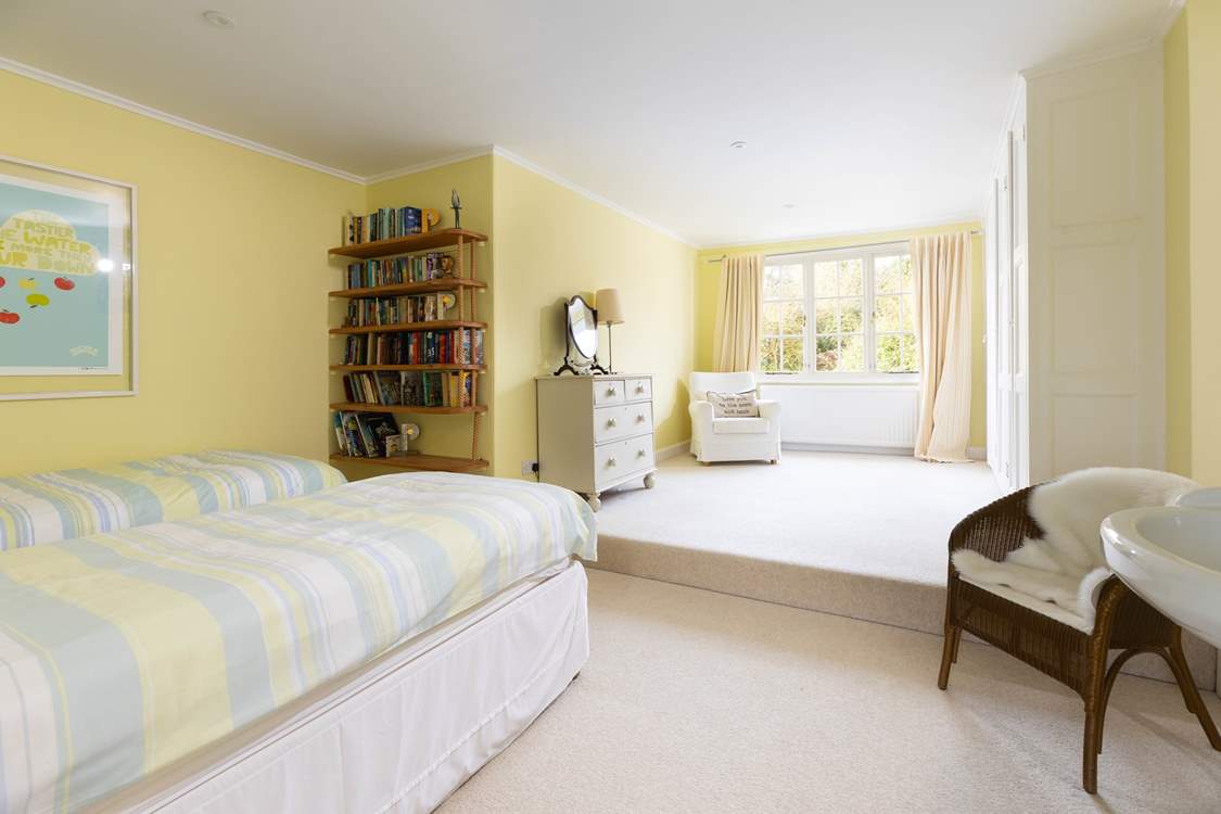 Spacious bedroom 3, snuggle up with a good book or simply stare out to the garden and day dream. Take care on the step.