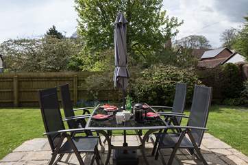The south-facing garden is perfect for al fresco dining.