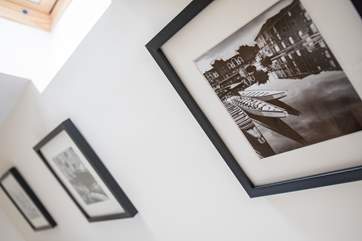 Lovely photos add to the homeliness of this cottage.