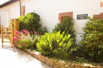 Pretty planting ensures that this property looks lovely whatever the time of year you stay.