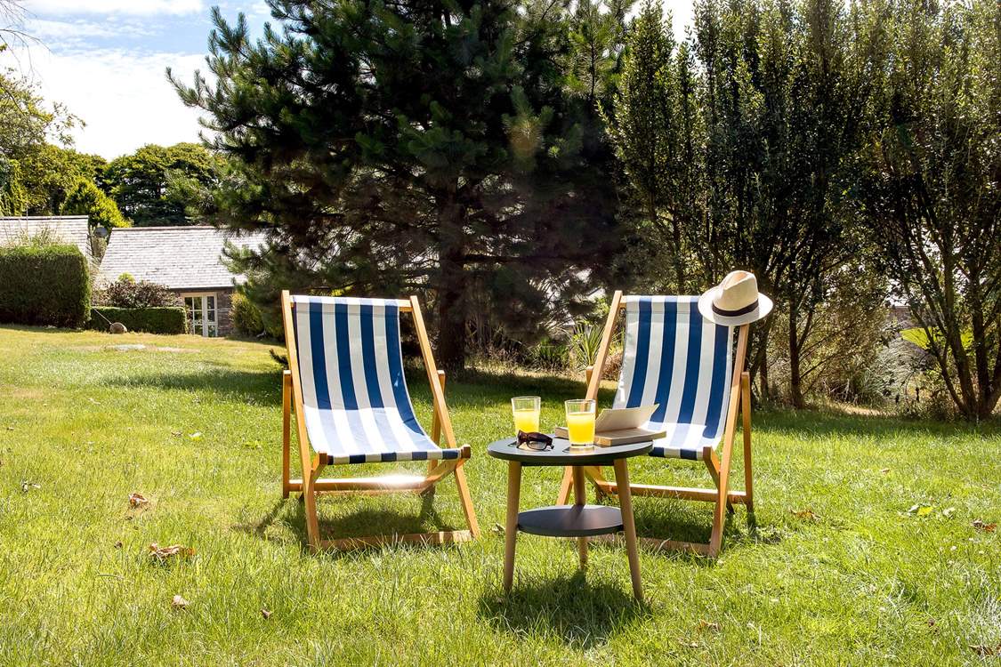Enjoy the wonderful setting relaxing in the deck chairs.