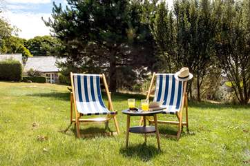 Enjoy the wonderful setting relaxing in the deck chairs.