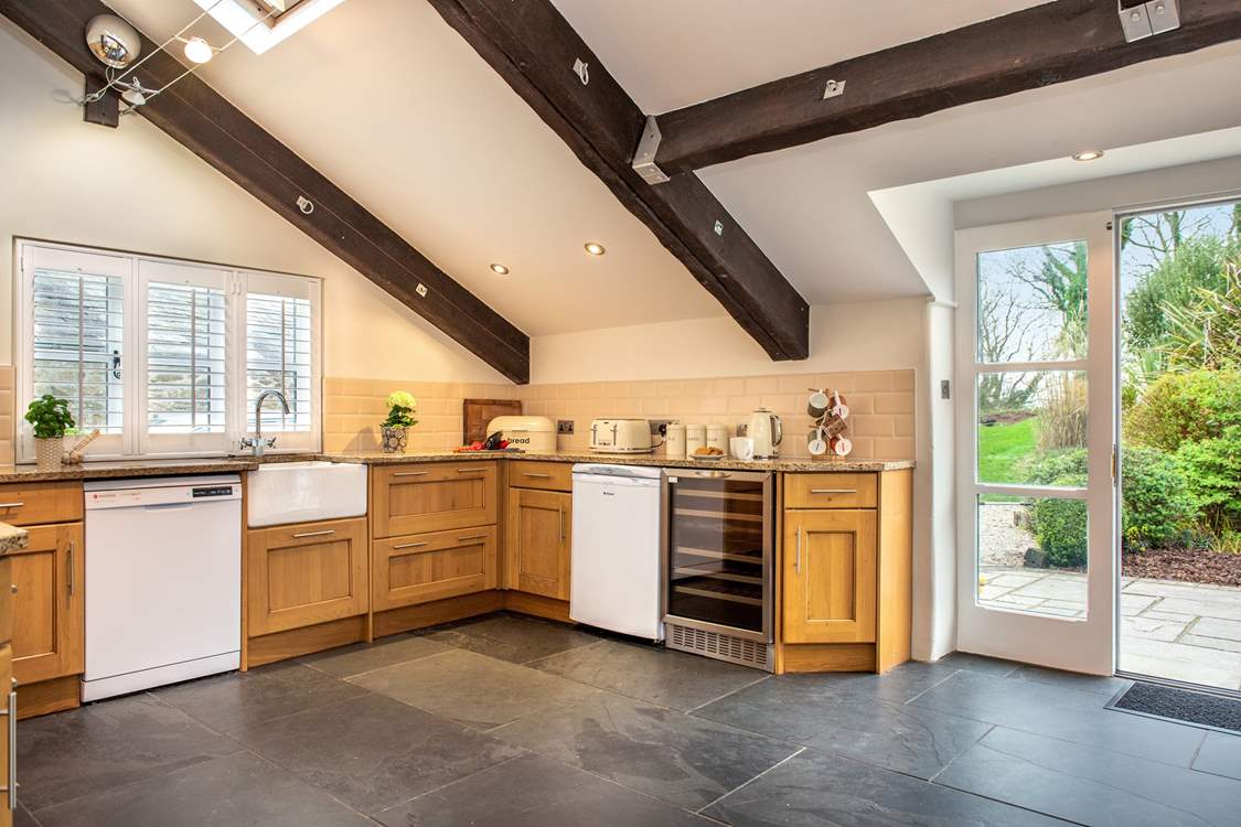 Large patio doors lead out to the terrace and garden.