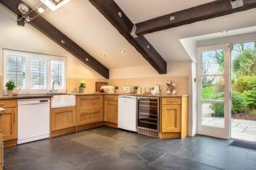 Large patio doors lead out to the terrace and garden.