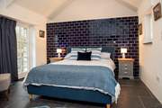 The stylish bedroom in the annexe (Bedroom 3) - the annexe is accessed from outside so ideal for those looking for some privacy.