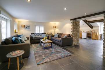 The living-room leads through from the kitchen/dining-room.