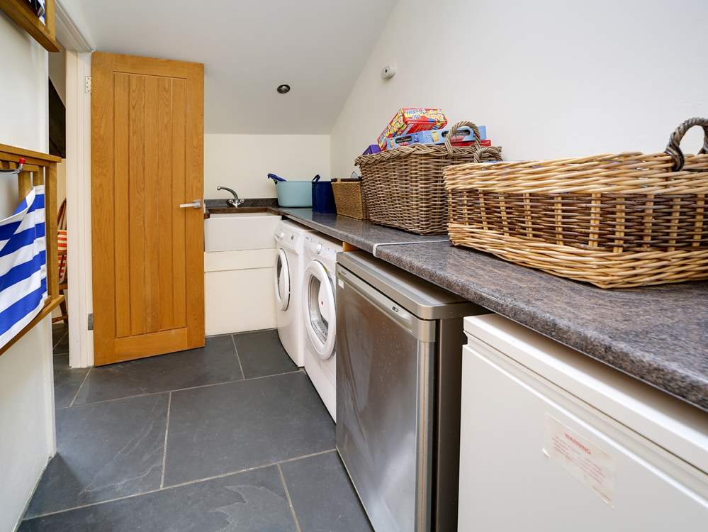 There's even a useful utility-area useful for storing all that essential holiday gear.
