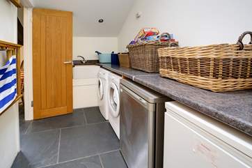 There's even a useful utility-area useful for storing all that essential holiday gear.