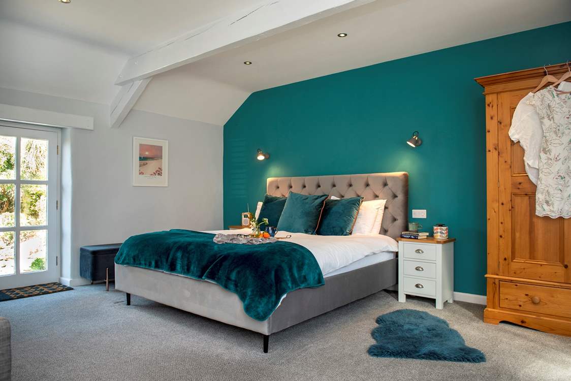 Bedroom 1 is wonderfully spacious with a super-king size bed.