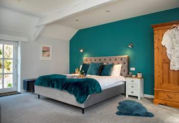 Bedroom 1 is wonderfully spacious with a super-king size sleigh bed