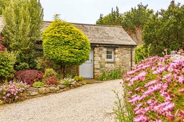 The front door into the annexe with the main cottage to the left.