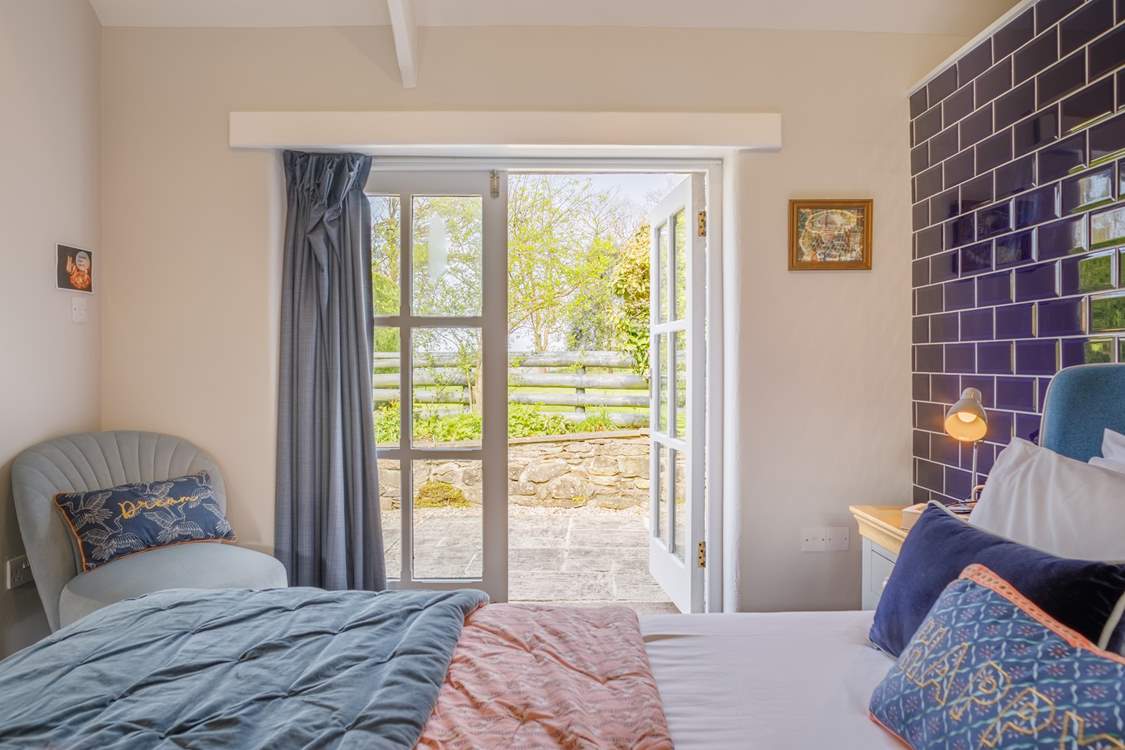 Bedroom 3 in the annexe has a lovely view over its own patio-area.