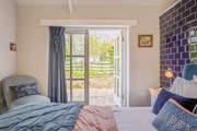 Bedroom 3 in the annexe has a lovely view over its own patio-area.