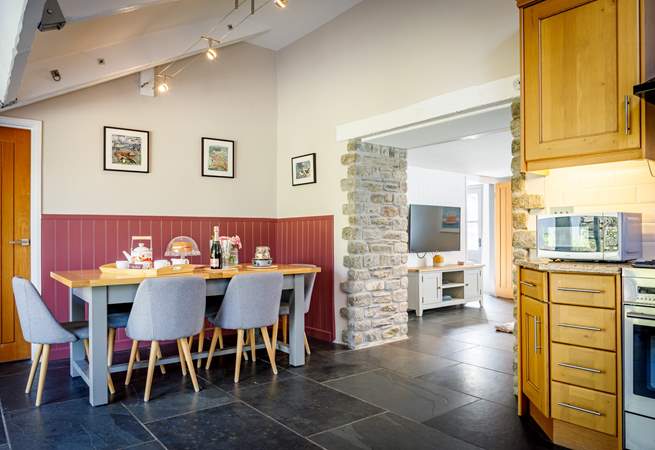 The dining-area leads through to the living-room.